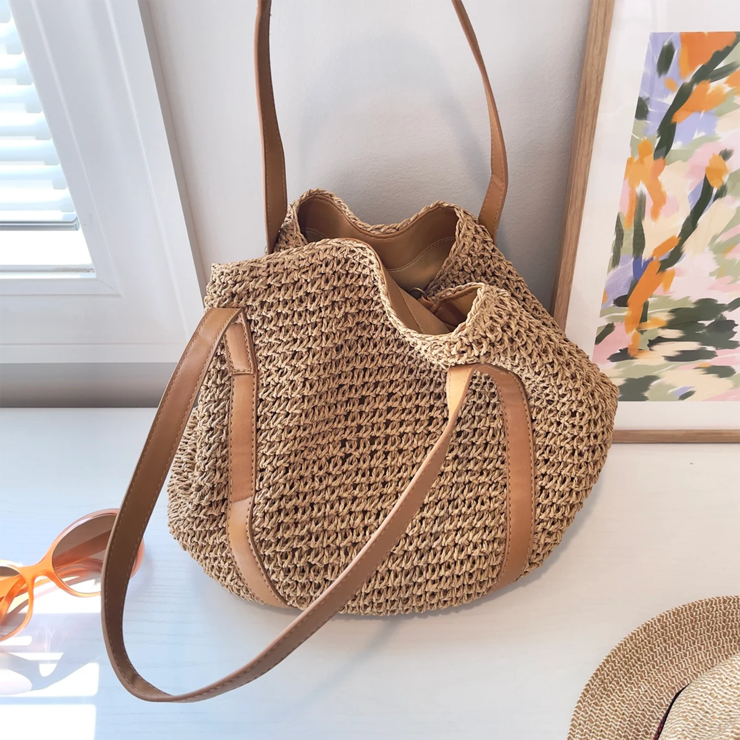 Natural Tan Hand-Woven Dumpling Shoulder Tote With Smooth Wide Carry Strips, Textile Inner Lining And Hidden Magnetic Snap Closure