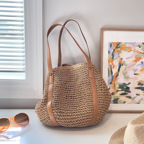 Natural Tan Hand-Woven Dumpling Shoulder Tote With Smooth Wide Carry Strips, Textile Inner Lining And Hidden Magnetic Snap Closure