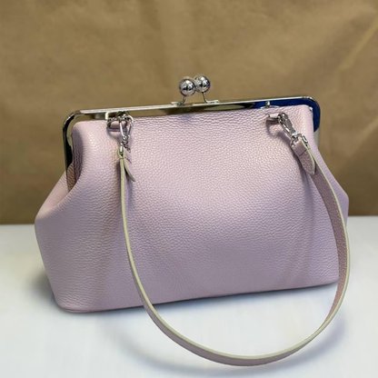 Blush Pastel Pebbled Kiss-Lock Frame Pouch With Silver Dual Ball Hardware, Slim Circular Shoulder Loop And Puffed Side Panel Silhouette