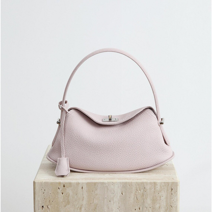 Triple-Tone Pebbled Curved Saddle Handbag With Arched Single Carry Loop, Metallic Turn-Lock Flap And Side Fabric Tab Detail