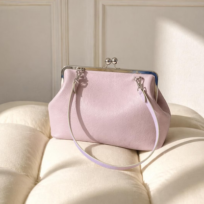 Blush Pastel Pebbled Kiss-Lock Frame Pouch With Silver Dual Ball Hardware, Slim Circular Shoulder Loop And Puffed Side Panel Silhouette
